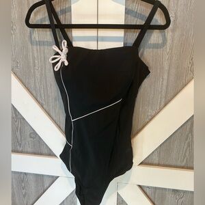 Bag072. Fit4U Sz 12 black one piece swimsuit with tummy control.